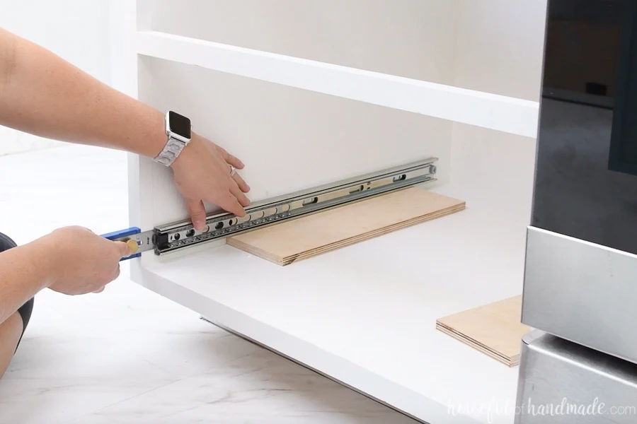 How to Install Sliding Drawers in Kitchen Cabinets